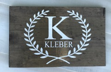 12x16 inch wood sign family name and initial with laurels
