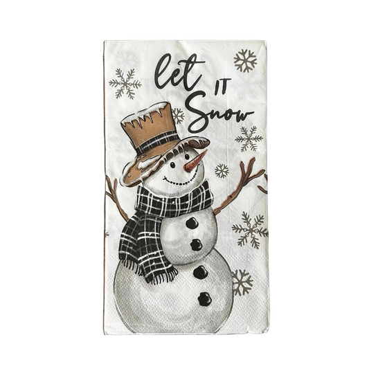 Napkin with a snowman design and 'Let It Snow' text on a dark background